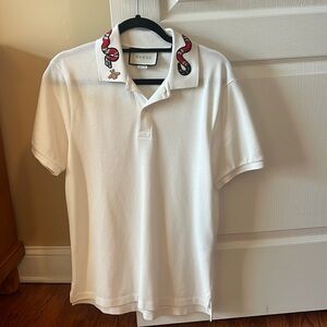 Gucci mens snake and bee white polo size medium has been worn